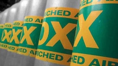 row of scuba tanks marked for nitrox enriched air